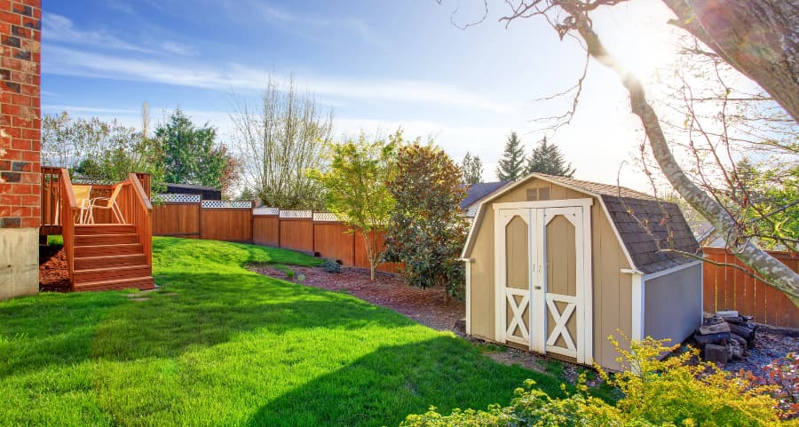 Fenced backyard with storage shed in Allentown